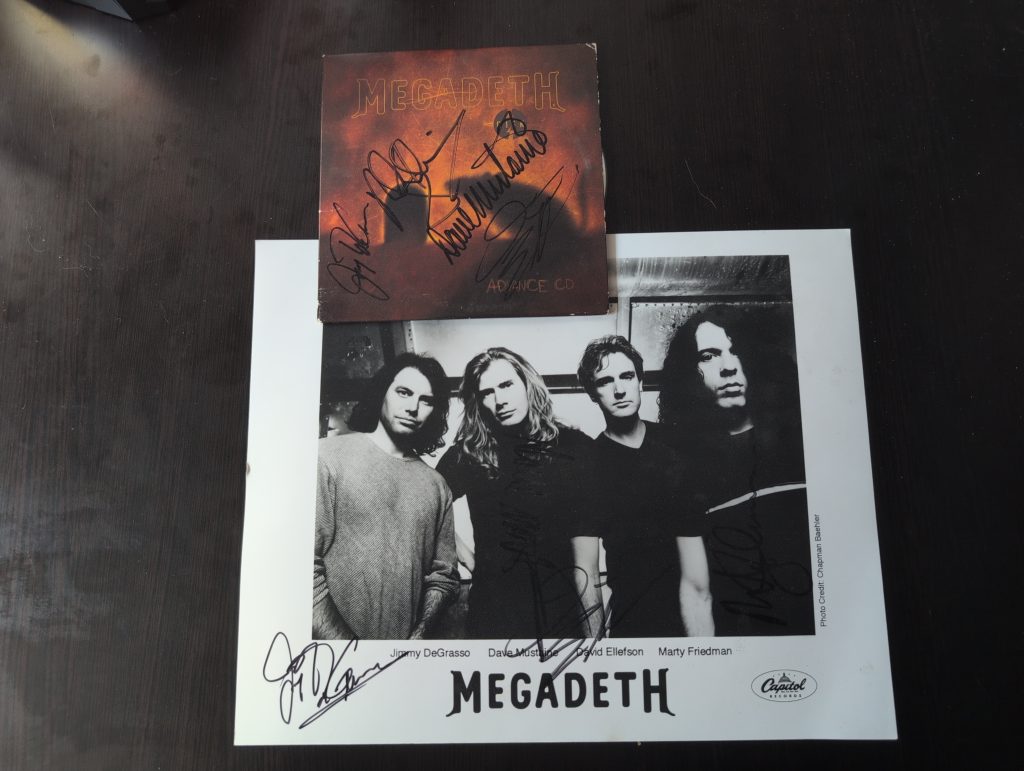 Signed Megadeth glossy and CD cover