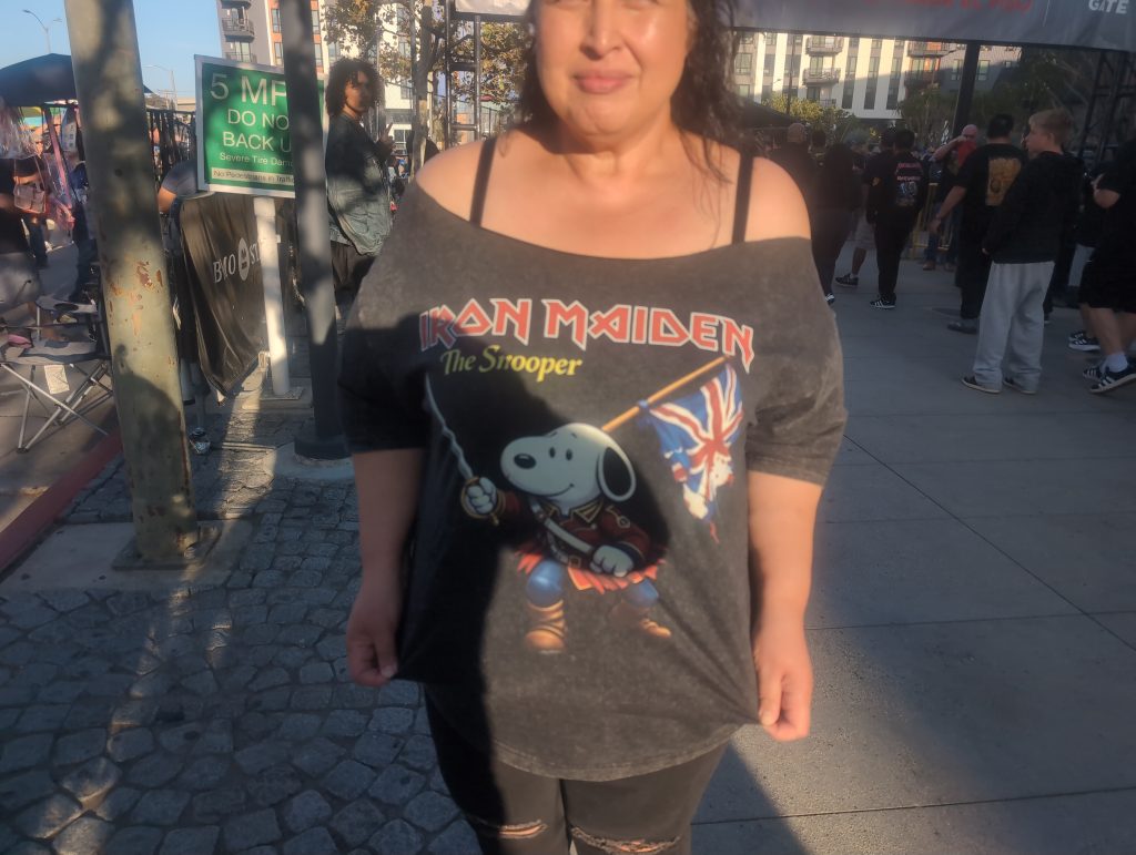 Fan wearing an Iron Maiden x Snoopy t-shirt, The Snooper